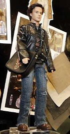 Metrosexual Ken and his mysterious man purse 
